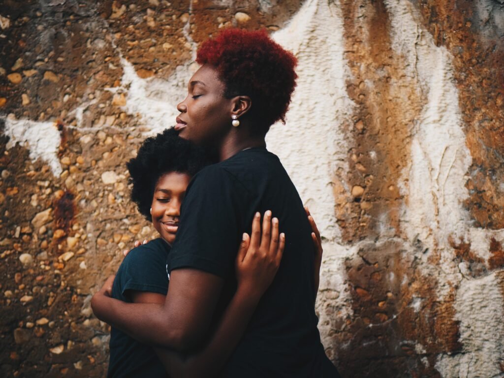 Two Black Women Hugging