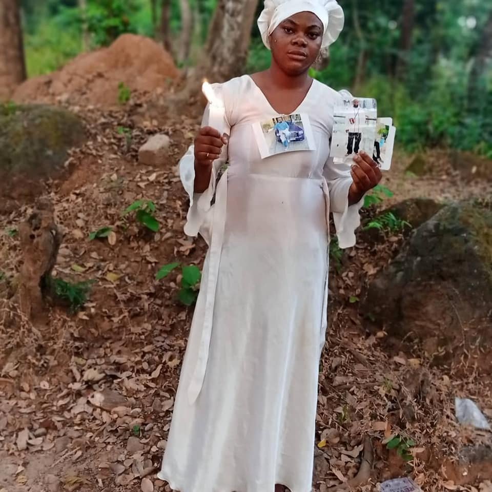 Mysterious Lady Burns Candle On Hushpuppi'S Picture (See Pics) Mysterious Lady Burns Candle On Hushpuppi'S Picture (See Pics)