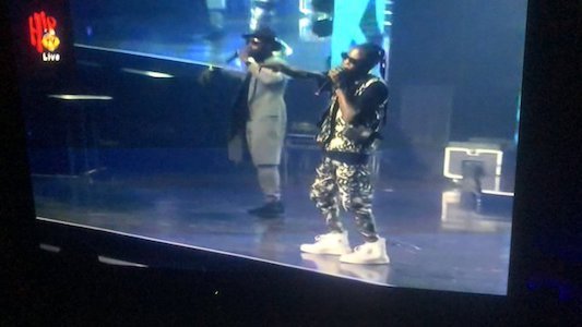 Laycon Performing On Stage With Dj Neptune