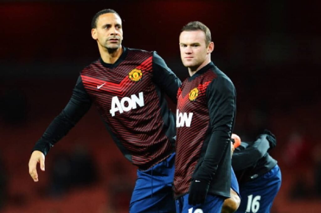Manchester United Players, Weyne Rooney And Rio Ferdinand.