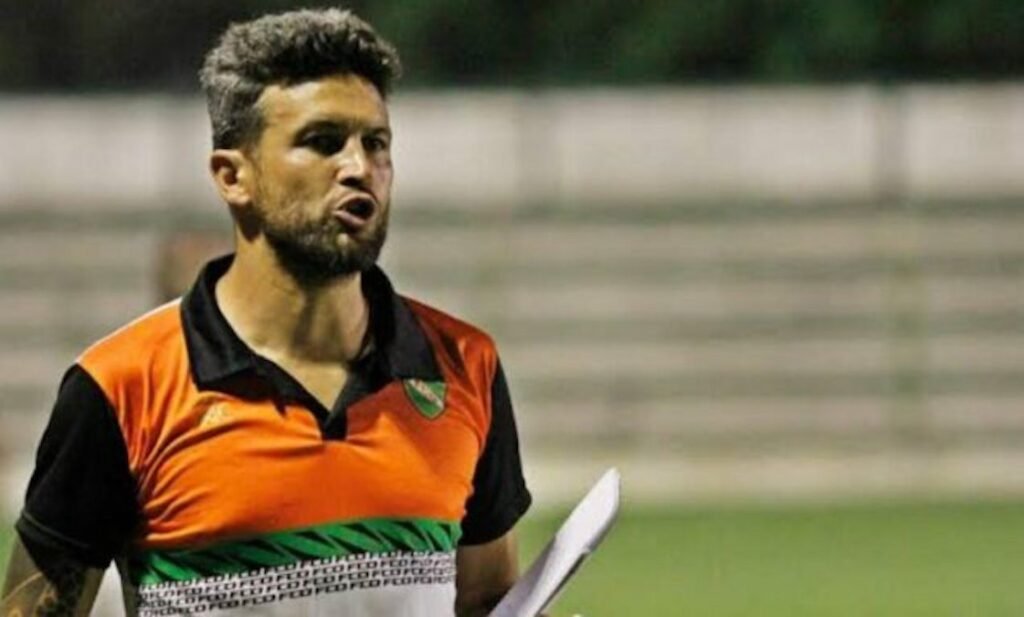 Football Coach Shot During A Match